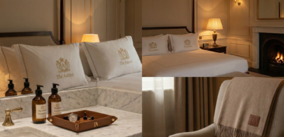 Luxury hotel room featuring custom-branded pillows, toiletries, and amenities designed to enhance guest experience.